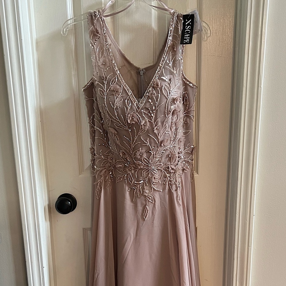 Beaded V-neck full length formal dress.